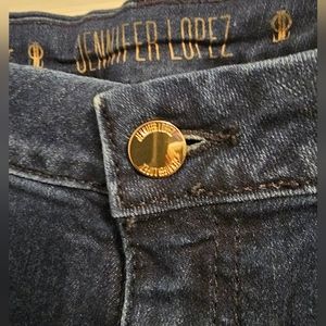 Jennifer Lopez bootcut jeans. Size 16 dark wash with gold accents.